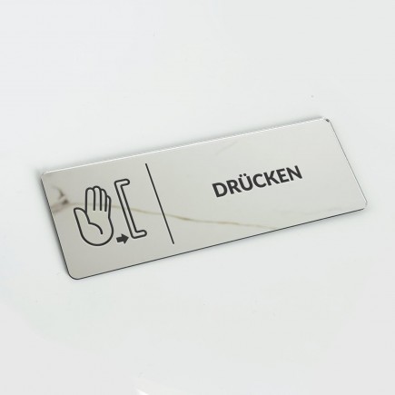 VERSPIEGELTES INFORMATIONSSCHILD „DRÜCKEN“